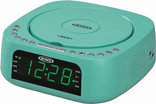 Jensen Teal Modern Home Audio CD Player Tabletop Stereo Dual Alarm Clock Digital FM Radio | Top-Loading CD/MP3/WMA Player | USB Charging Port 2.1A | Headphone Jack | 0.9 Display Green LED