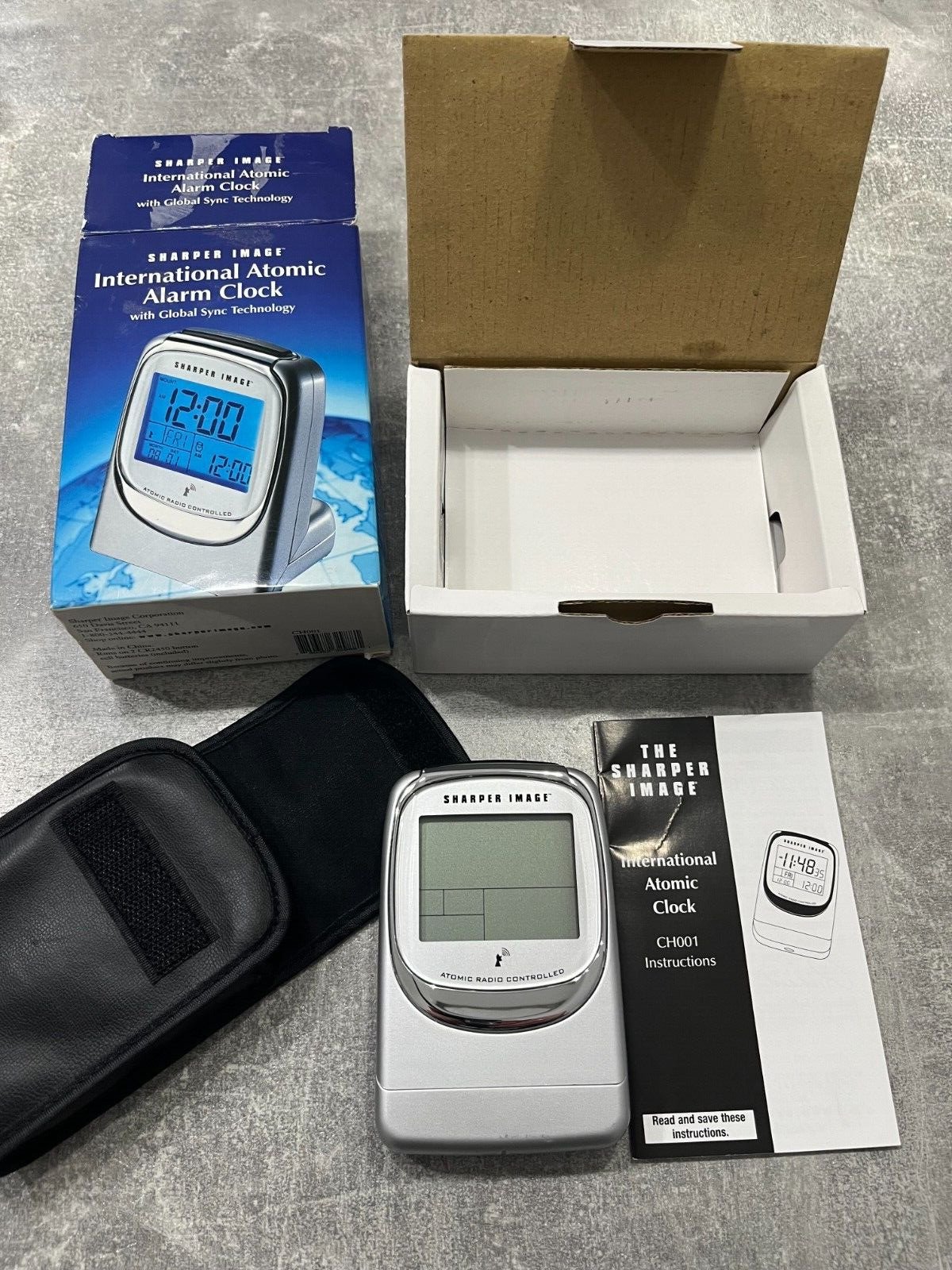 SHARPER IMAGE INTERNATIONAL ATOMIC ALARM CLOCK WITH GLOBAL SYNC TECHNOLOGY