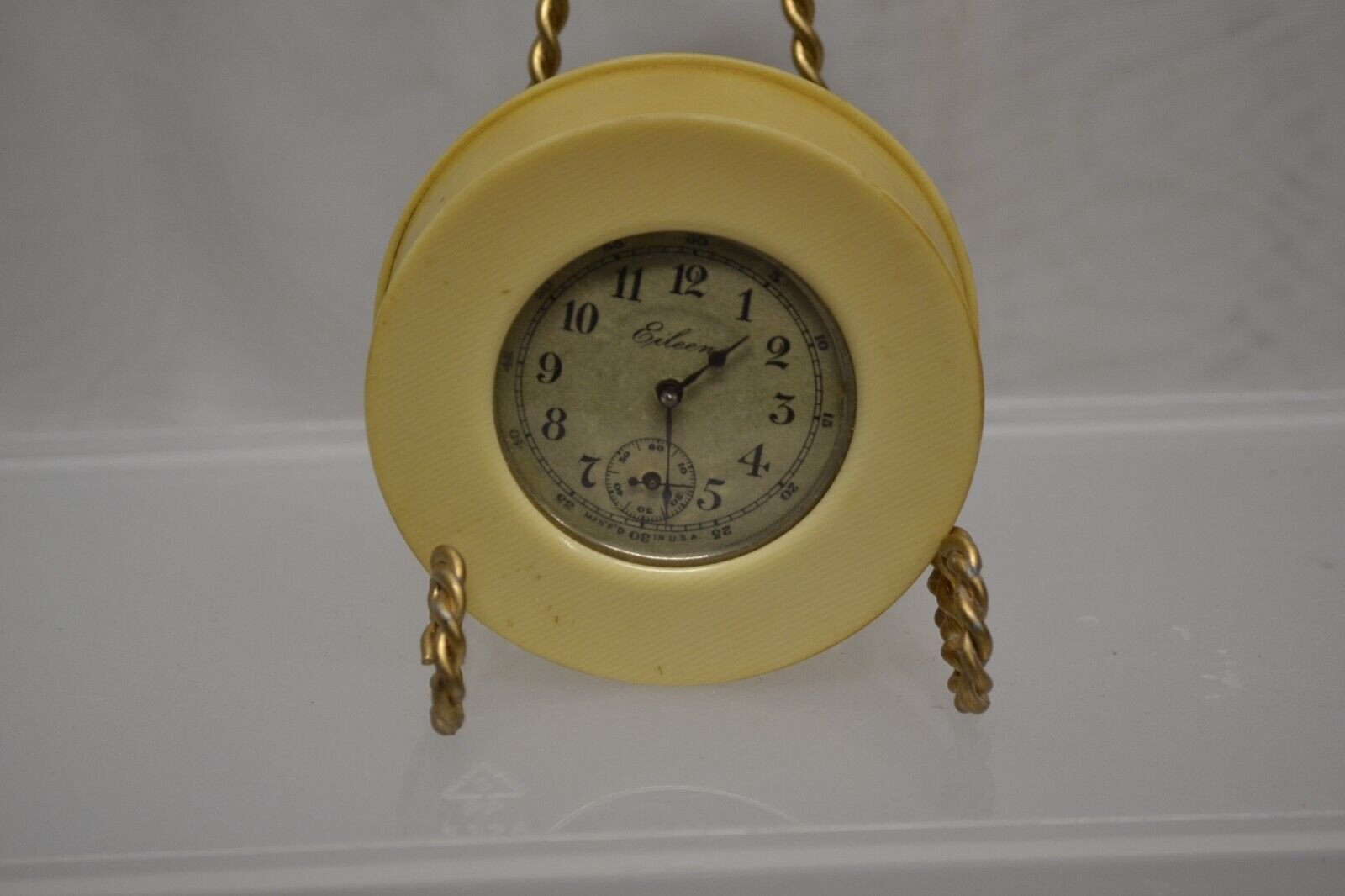 ANTIQUE EILEEN TABLE TOP CLOCK USA WORKS 3" IN DIA.