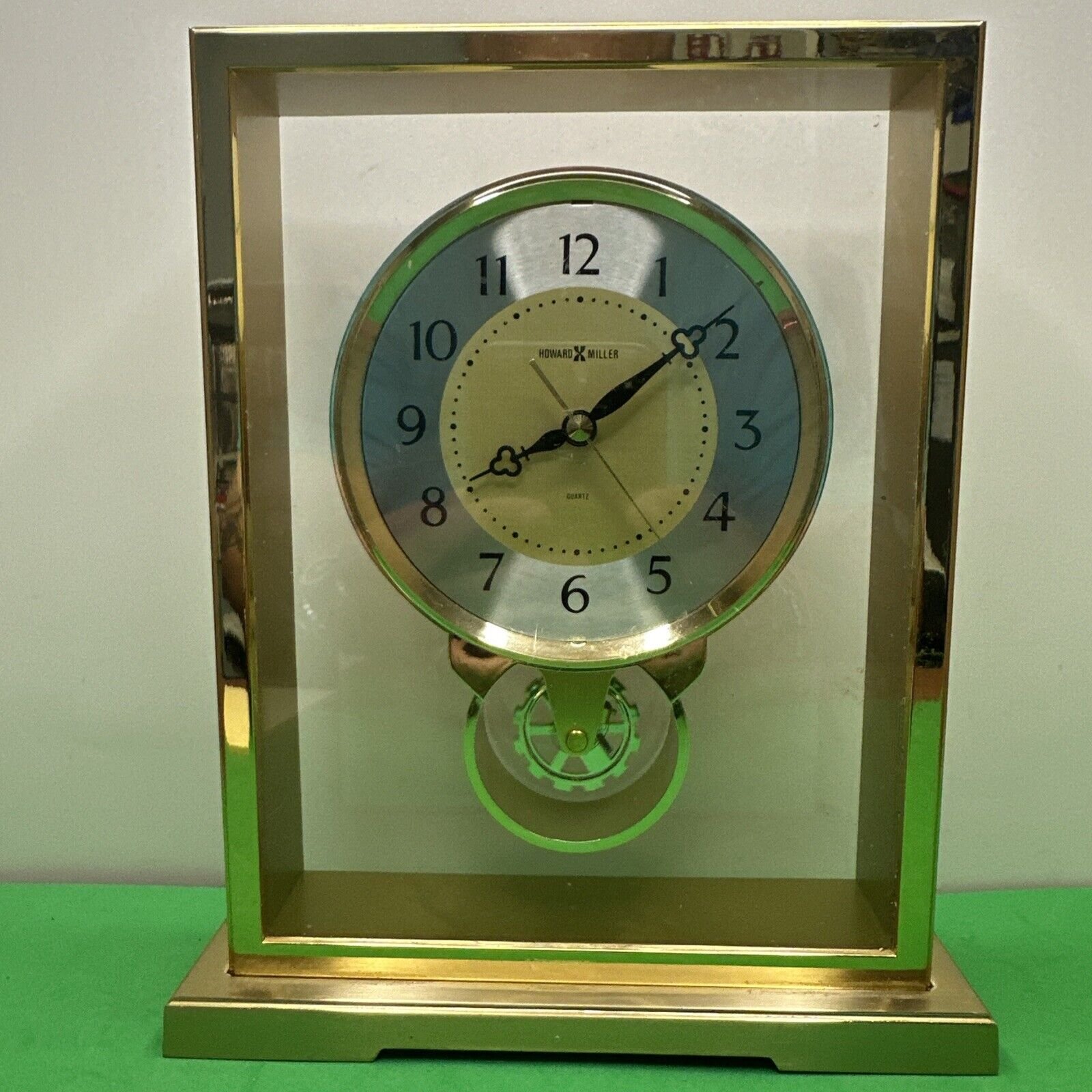 HOWARD MILLER RIVIERA 612230 MANTLE TABLE DESK CLOCK SPINNING WHEEL COG - BRASS