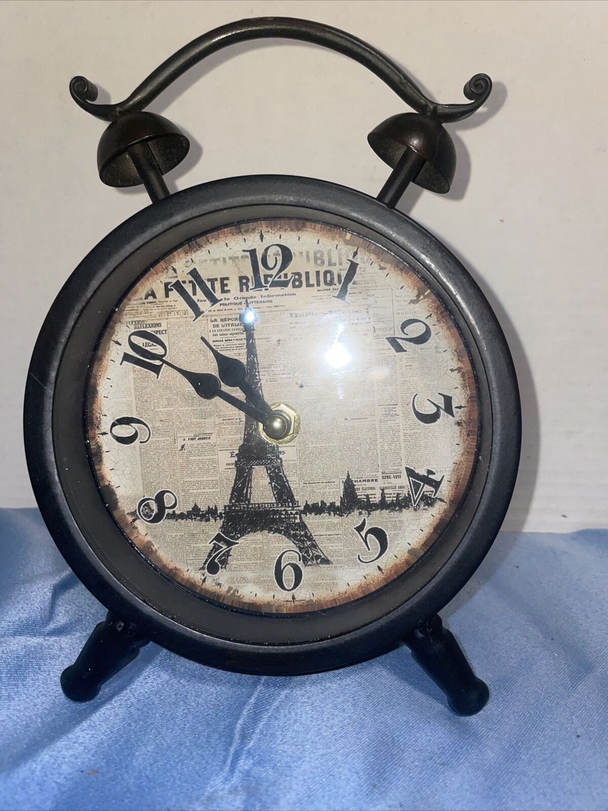 Modern Style Round Tabletop Clock in Dark Rust with Eiffel Tower