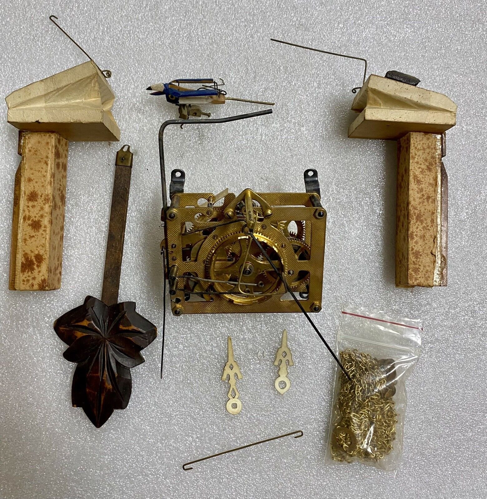 Japanese Cuckoo Clock Movement With Hands, Pendulum, Bellows, Chains, And Bird