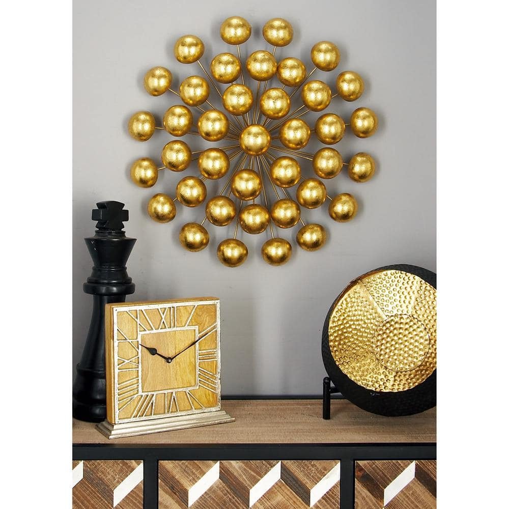 24 in. x 24 in. Metal Gold Starburst Wall Decor with Orb...