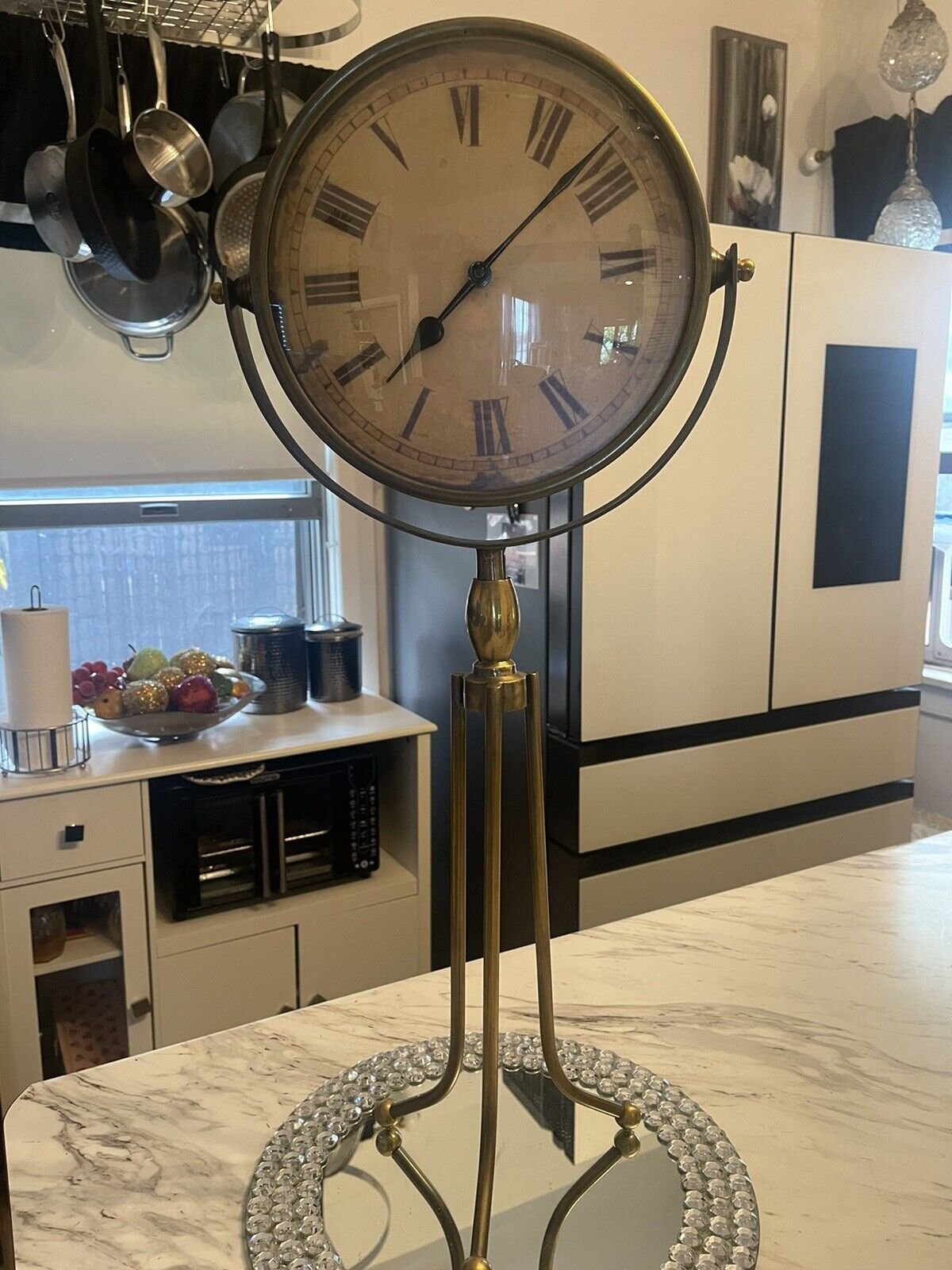 brass tripod floor/table clock