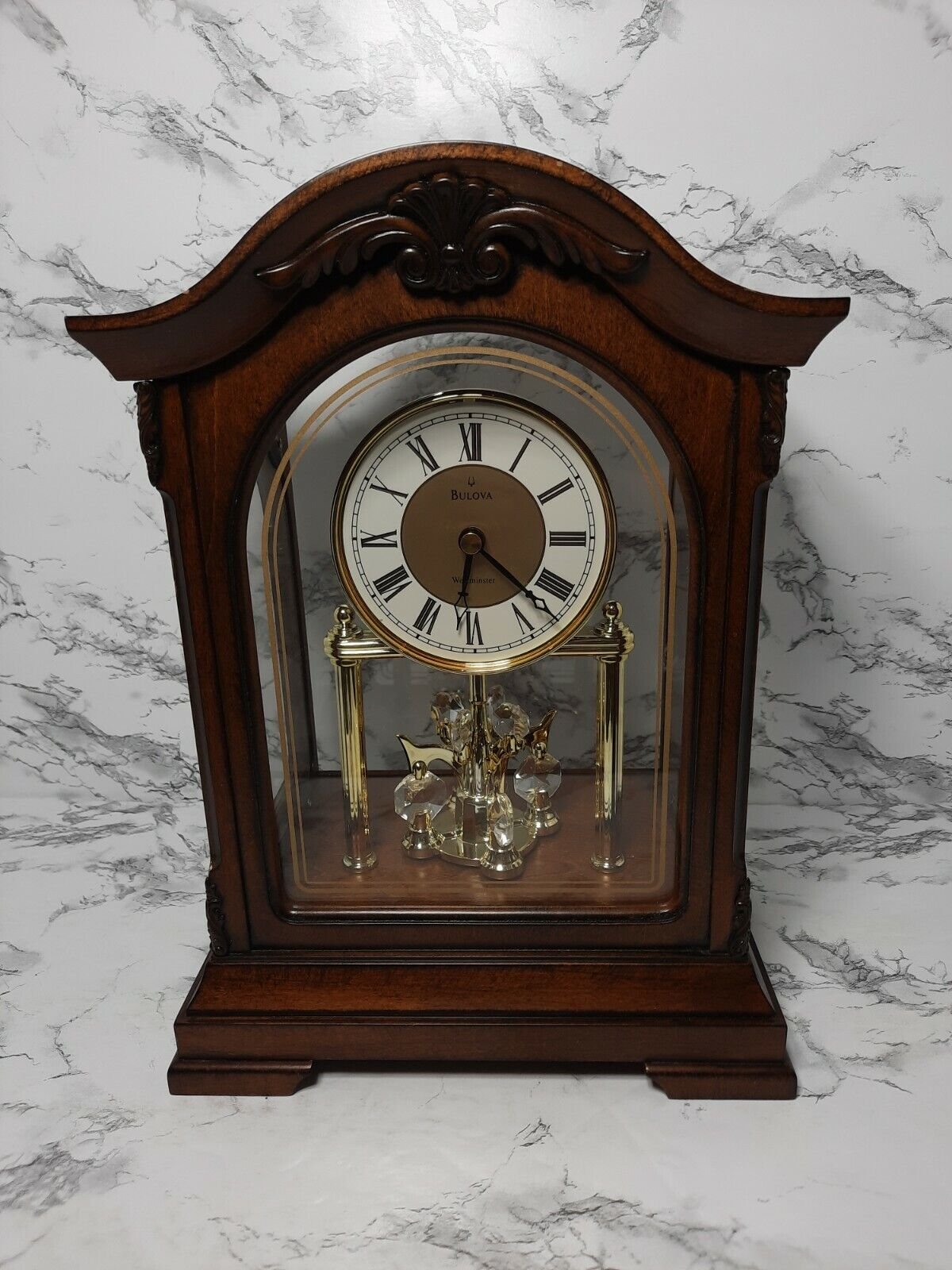 Bulova Clocks B1845 Durant Walnut Wood and Glass Revolving Pendulum Clock