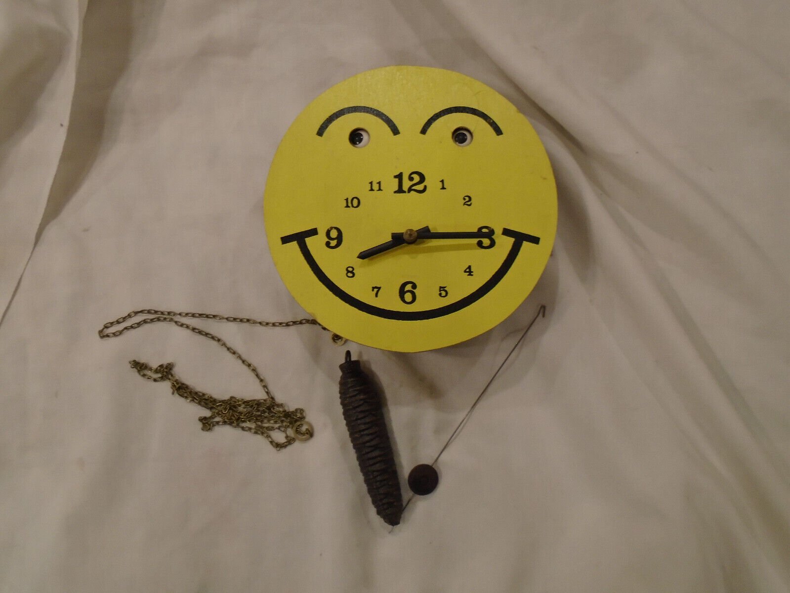 Rare Vintage German Smiley face animated moving eyes novelty wall clock runs