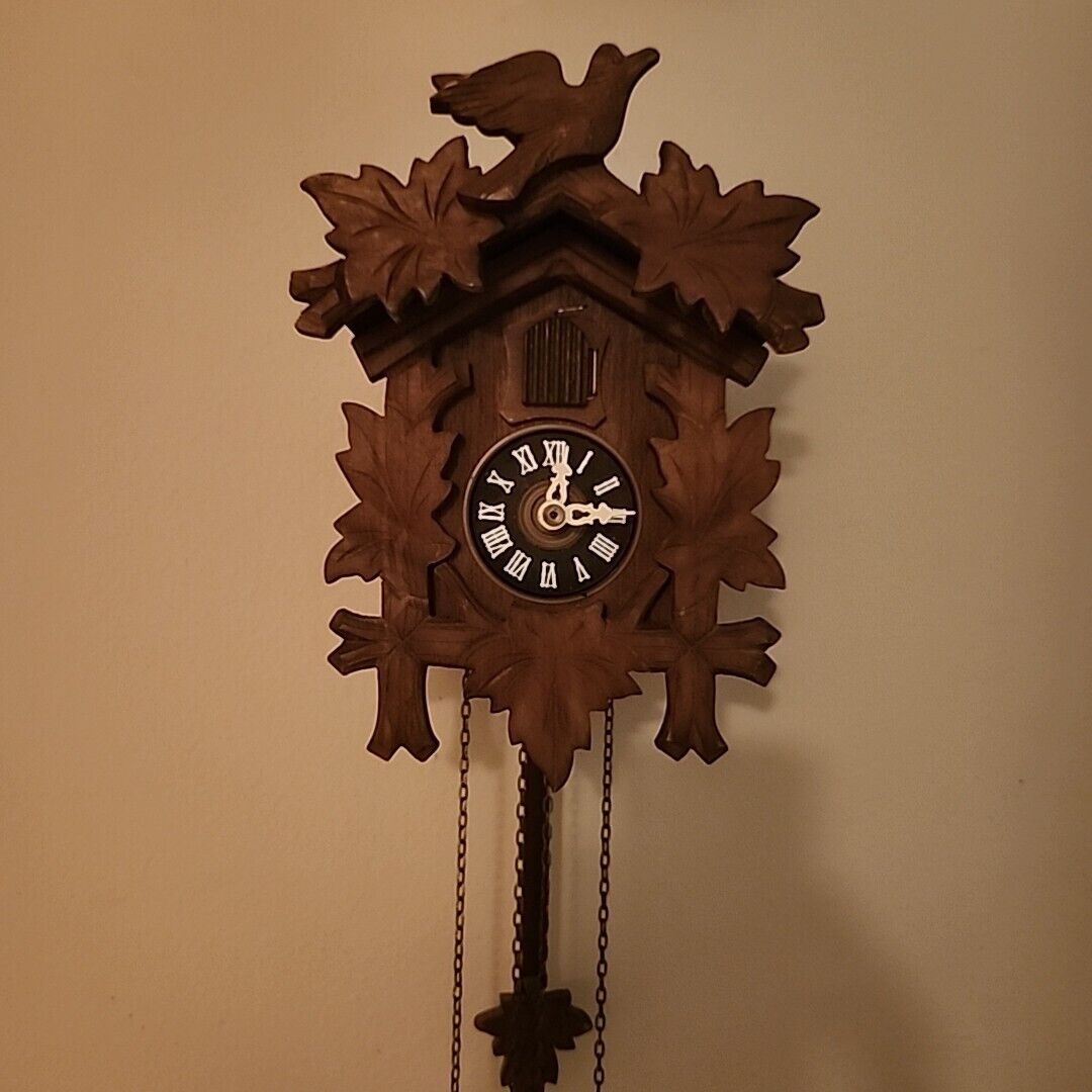 River City Cuckoo clock w/pendulum, weights, chains, manual, one day wall clock