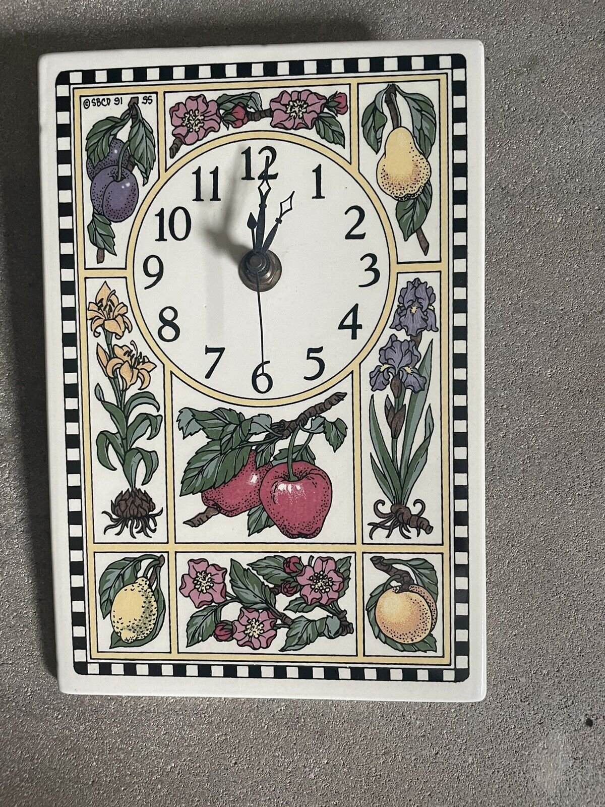 Santa Barbara Ceramic Design Fruit/Floral Wall Clock. 6” Wx8” H New Condition