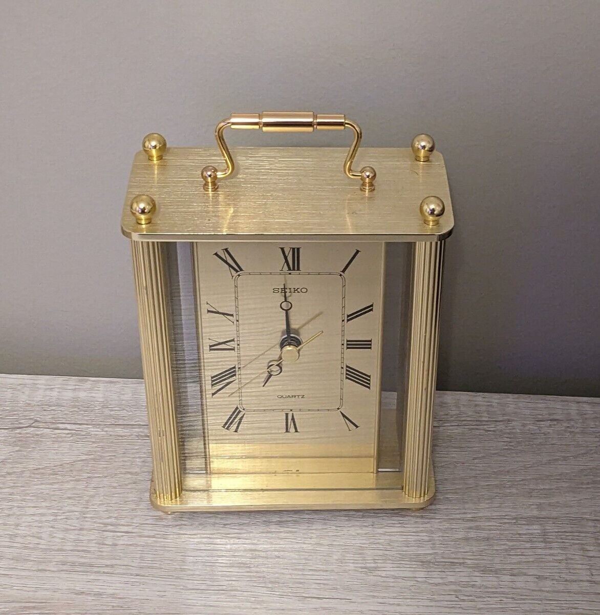 Seiko Clock brass Desk/ Mantel Carriage -No Box, Some Cosmetic Wear And Tear.