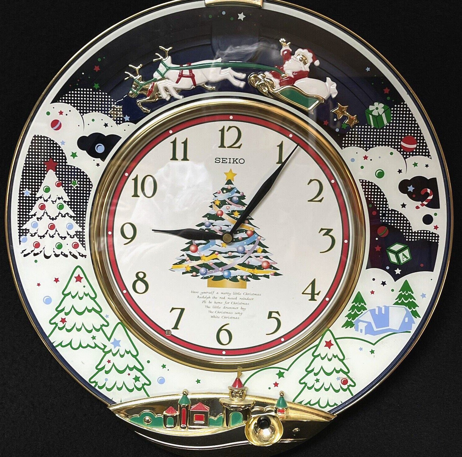 Seiko Melodies In Motion Wall Clock Christmas Santa and Sleigh QXM117GR