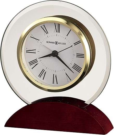 Howard Miller Dana Tabletop Clock - Curved Glass & Wooden Finish Base, Battery Operated Alarm, Roman Numerals, Decorative Analog Desk Table Clock for Home or Office Decor