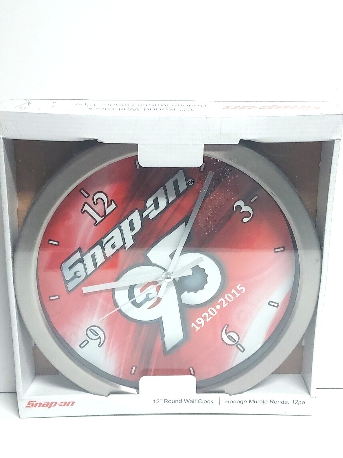 12” Round Wall Clock Battery Operated Stainless Steel color. 95th Anniversary