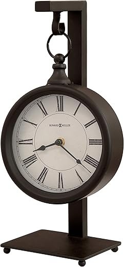 Howard Miller Loman Mantel Clock, Hangable Round Analog Dial Roman Numerals with Quartz Movement, Solid Metal Frame Black Finish Idle Alarm Clock for Home Decor & Office Battery Powered