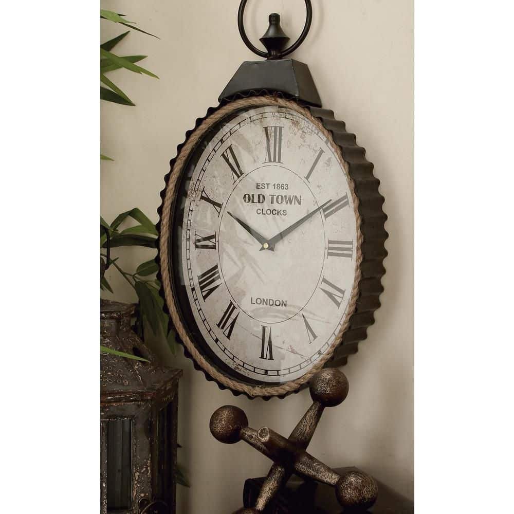 12 in. x 21 in. Black Metal Pocket Watch Style Wall Clock...