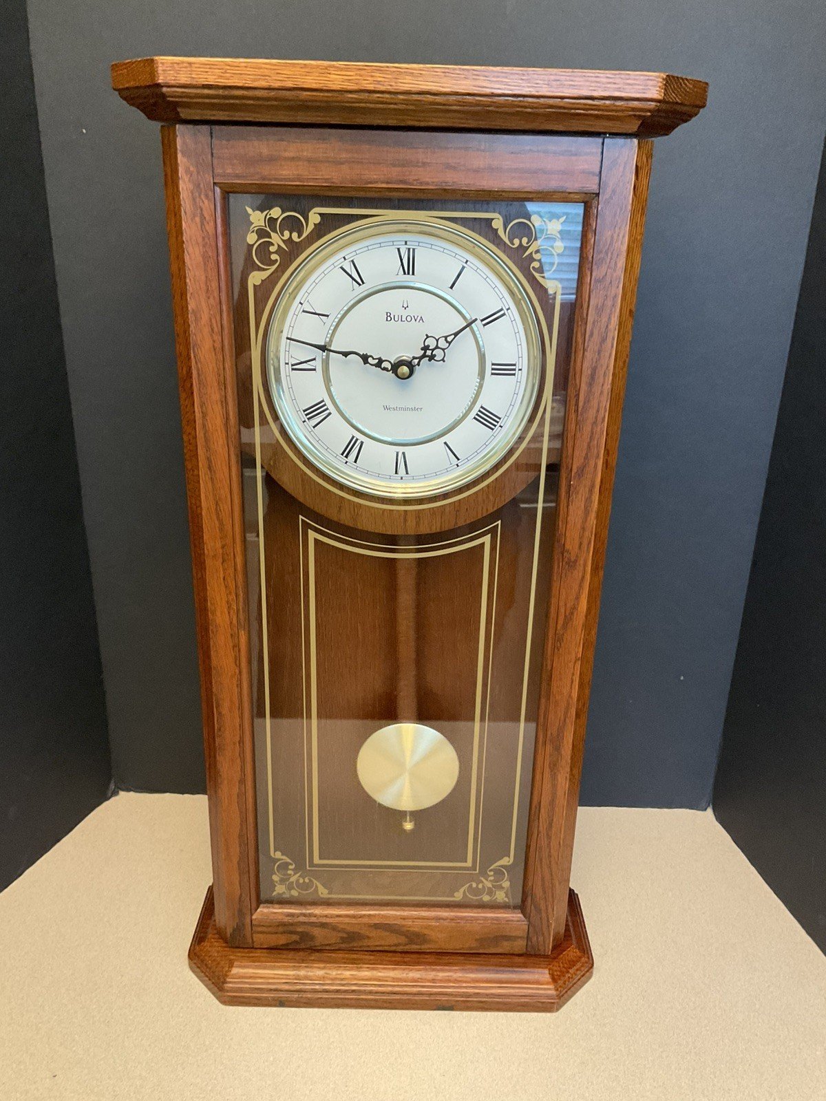 Bulova Cirrus Oak Wall Clock Westminster Chime C3375. Works Great!