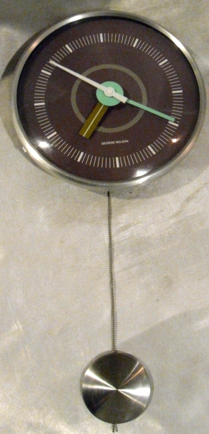 GEORGE NELSON WALL CLOCK WITH SWINGING PENDULUM