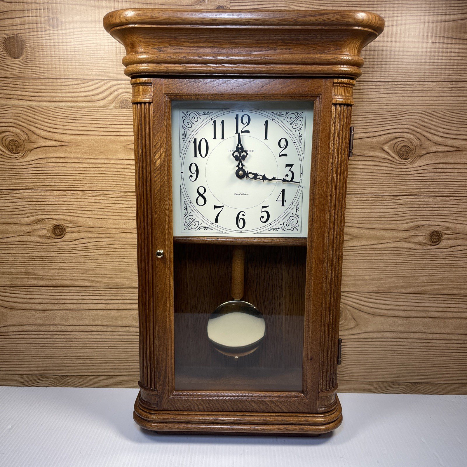 Howard Miller Sandringham Oak Wall Clock - Dual Chime Battery Operated Version