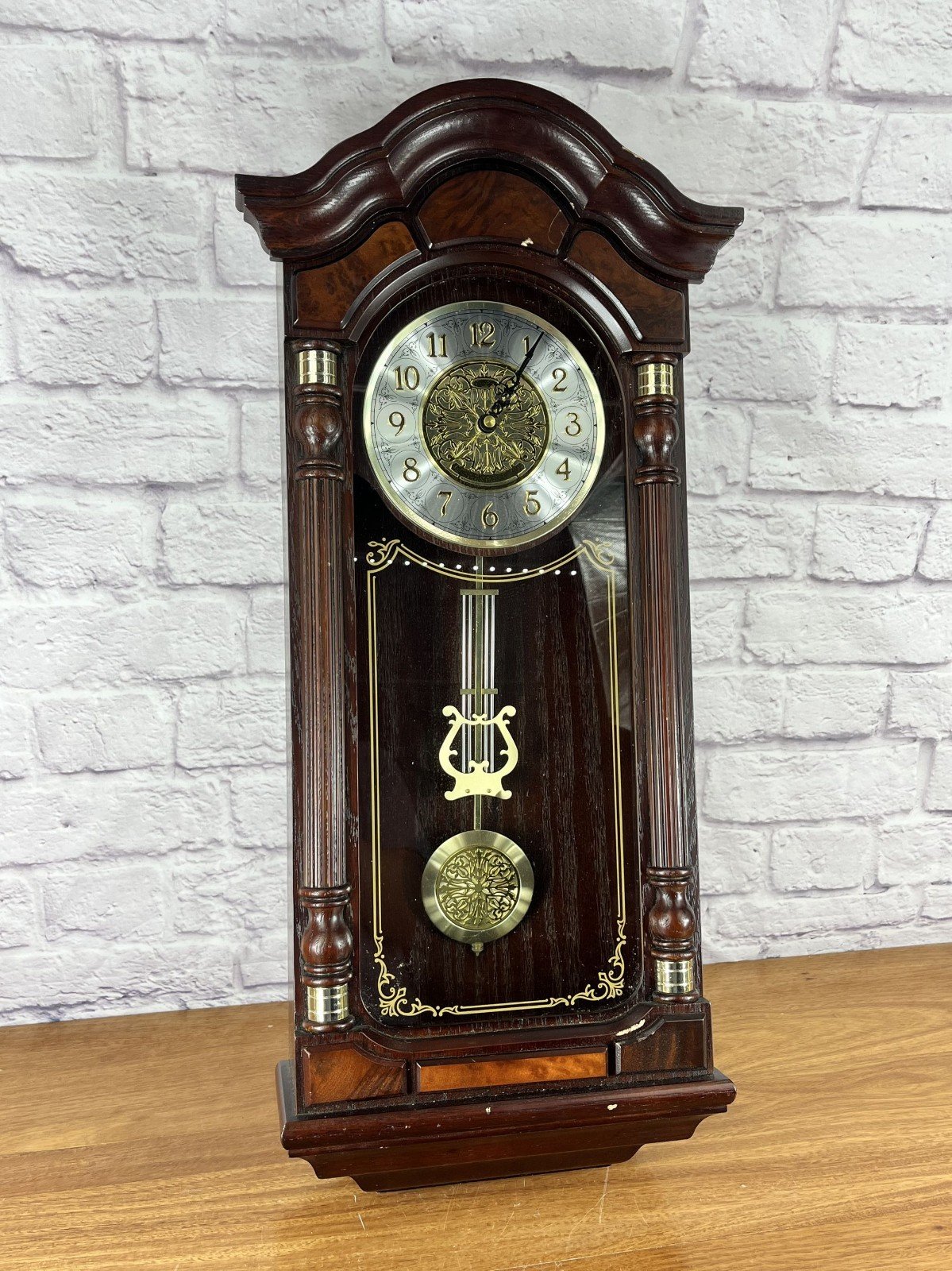 Seiko Stately Dark Brown Solid Oak Case Wall Clock with Pendulum and Dual Chimes