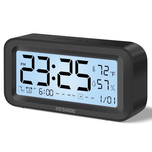 KESHIDE Night Light Digital Alarm Clock Battery Operated with Indoor Temperature Humidity, Desk Small Clock,Snooze Model,12/24H Display for Bedrooms Heavy Sleepers Kids Travel Bathroom (Black)
