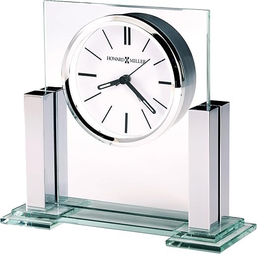 Howard Miller Metropolitan Tabletop Clock – Glass & Metal Alarm Clock with Polished Silver Columns Battery Operated Quartz Movement Modern Desk Décor & Luminous Hands for Office & Home Decor