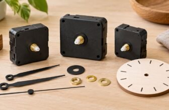 Illustration of small clock movements and hands arranged on a work surface small clock movements