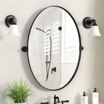 23.6 in. W x 35.4 in. H Oval Black Metal Framed Wall...