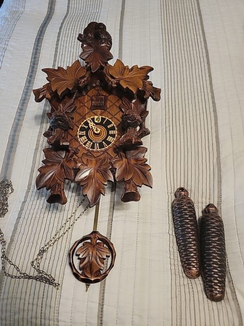 Antique Black Forest cuckoo/ two Weight clock by Regula Germany/ Certificate