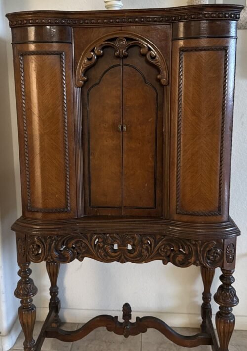 Antique carved radio cabinet