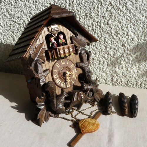 A. SCHNEIDER CARVED SQUIRRELS GERMAN MUSICAL CUCKOO CLOCK 1 DAY W/NIGHT SILENCER