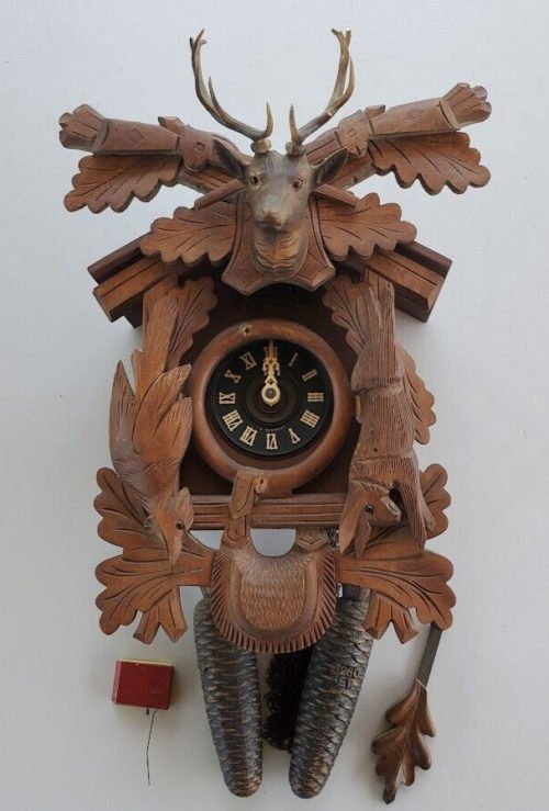 A Schneider Hand Carved Walnut Black Forest Hunter Cuckoo Clock Germany 8 Day