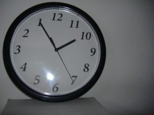 Backwards clock runs counter clockwise novelty