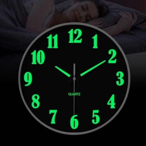 Black plastic luminous wall clock, battery powered, round, silent quartz clock.