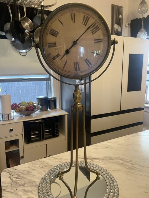 brass tripod floor/table clock