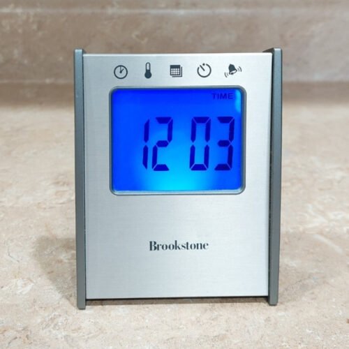 Brookstone 5-in-1 Sensor Travel Clock Time Temp Date Alarm Timer Backlight LED