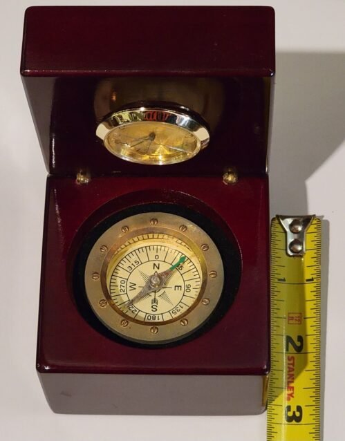 Clock and compass in wooden display box approx. 3 inches