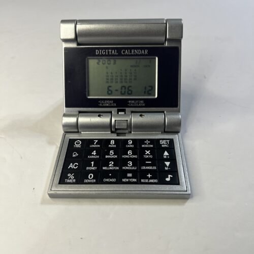 Collapsible Travel Alarm clock, calculator, world time, calendar, 3.5” Folded