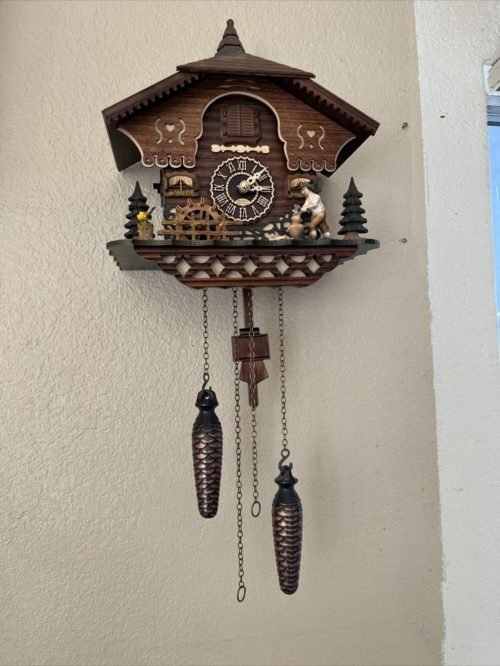 Cuckoo clock Musical Moving Wood Chopper And Moving Mill Wheel
