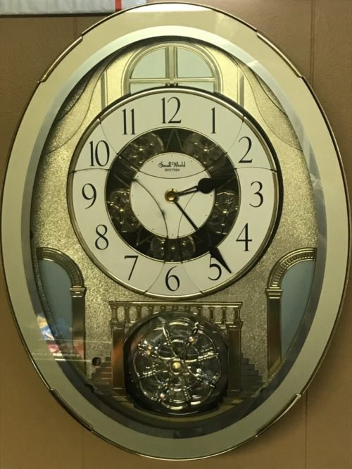 EUC Rhythm Small World Brilliance Moving Dial Musical Motion Wall Clock 4MH787-R