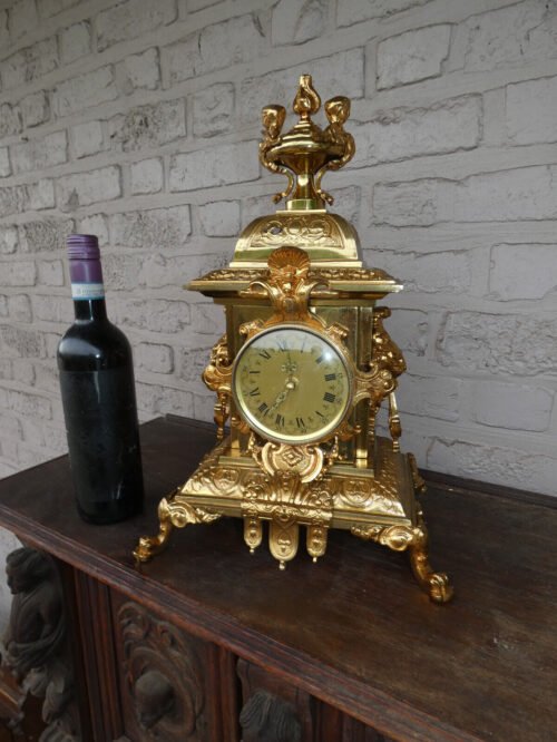 french bronze caryatid angel lion heads mantel clock
