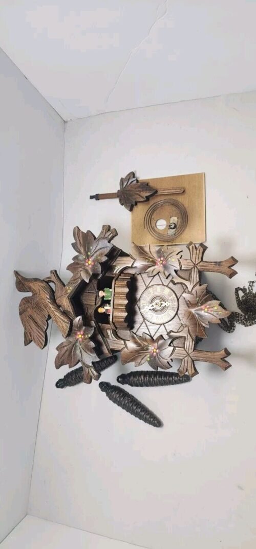 German Feeding Birds 13" Musical Chalet Cuckoo Clock By Swiss musical movements.