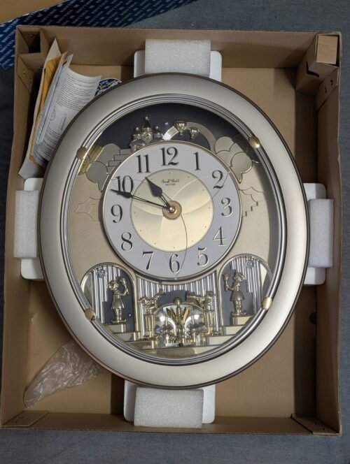 Golden Stars Rhythm Wall Clock 4MH843WD19 Silver Musical Motion Clock w/ Box