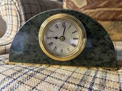 Green Marble Desk Clock, Oval shape desk clock with gold details and fitting.