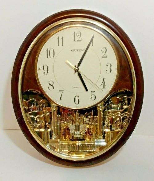 GUTEN QUARTZ OVAL ROTATING MUSICAL MOTION WALL CLOCK 6 MELODIES 16X14 RARE