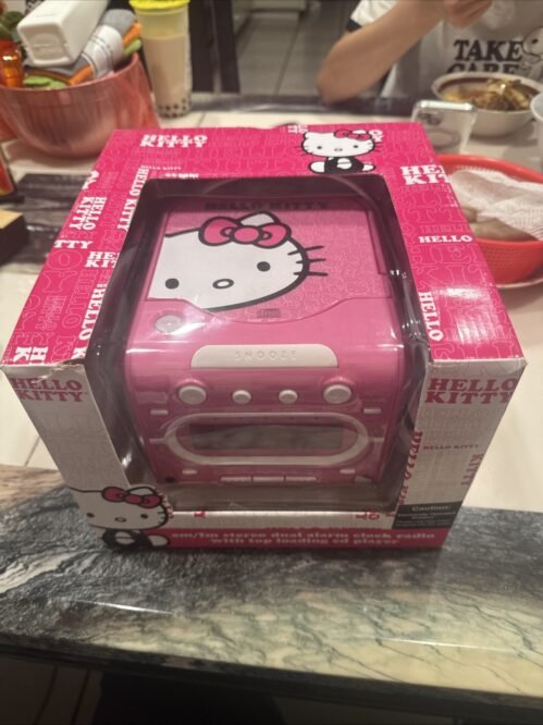 Hello Kitty Am/fm Stereo Dual Alarm Clock Radio With Top Loading Cd Player