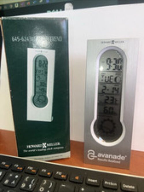 Howard Miller portable snooze alarm weather climate clock time