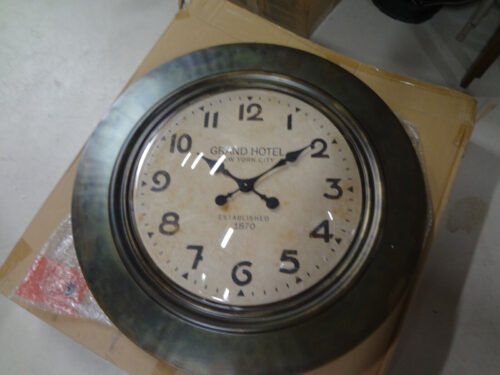 Iron Wall Clock Round - Iron has Shades of Brown, Green, Gold and Black