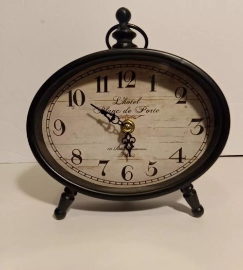 L'hotel Blanc de Porta Paris Clock Analog Small Oval Freestanding Battery