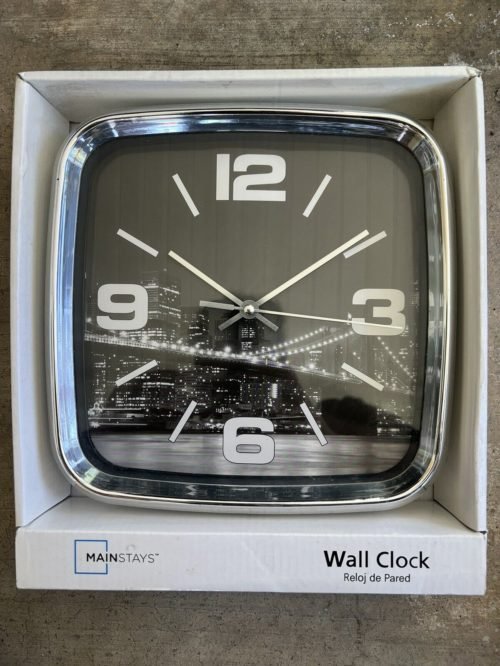 Modern Wall Clock With City Skyline Background