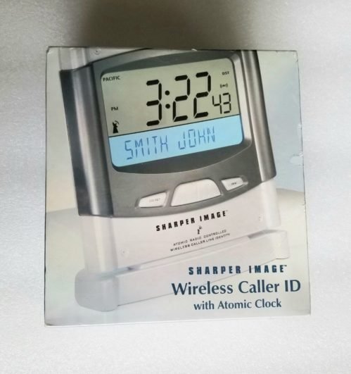 NEW FACTORY SEALED 2004 Sharper Image Wireless Caller ID with Atomic Clock CH002
