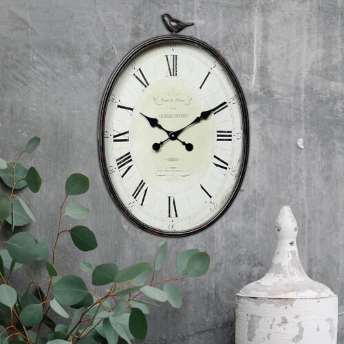 Oval Metal Wall Clock with Bird Design